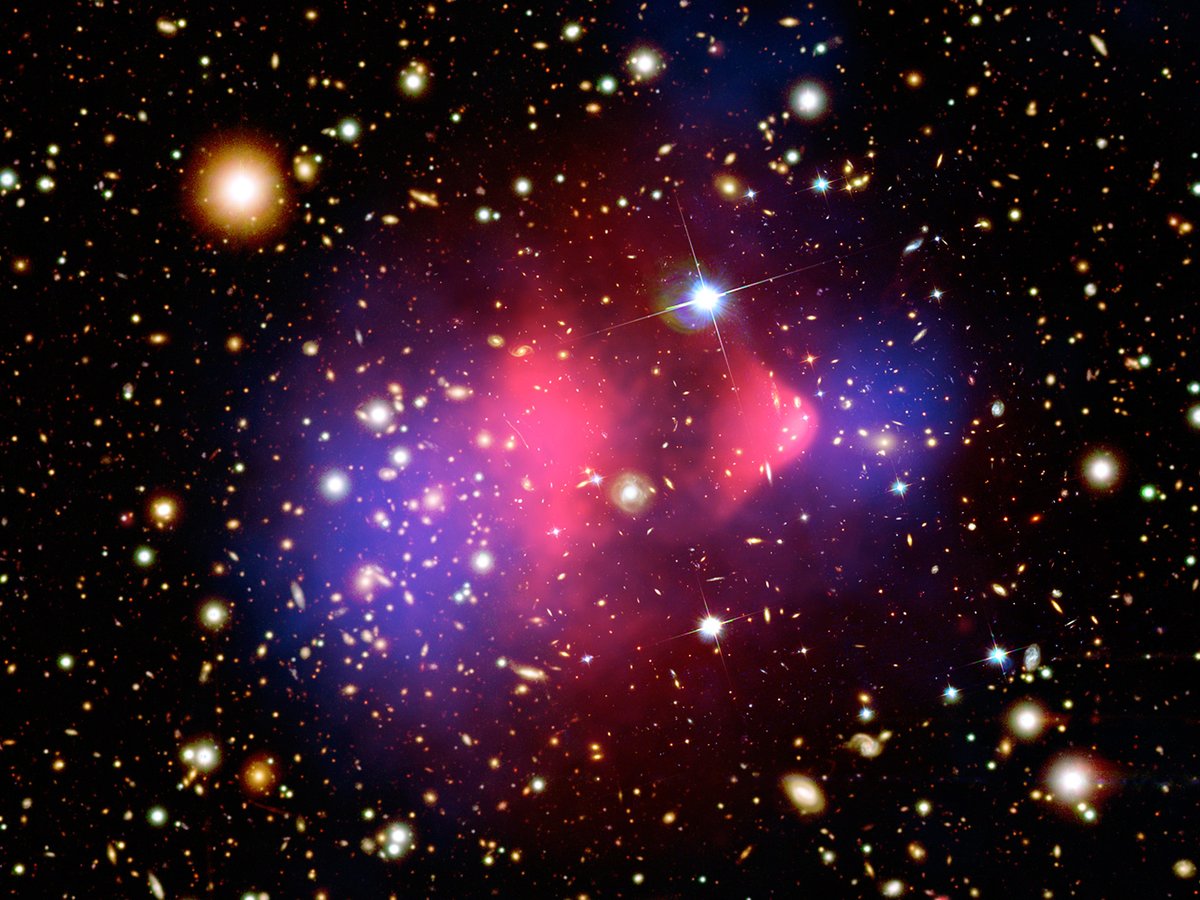 Hubble contributed the optical component (the orange and white galaxies) of the famous Bullet Cluster image. Credits:X-ray: NASA/CXC/M.Markevitch et al.Optical: NASA/STScI; Magellan/U.Arizona/D.Clowe et al.Lensing Map: NASA/STScI; ESO WFI; Magellan/U.Arizona/D.Clowe et al.