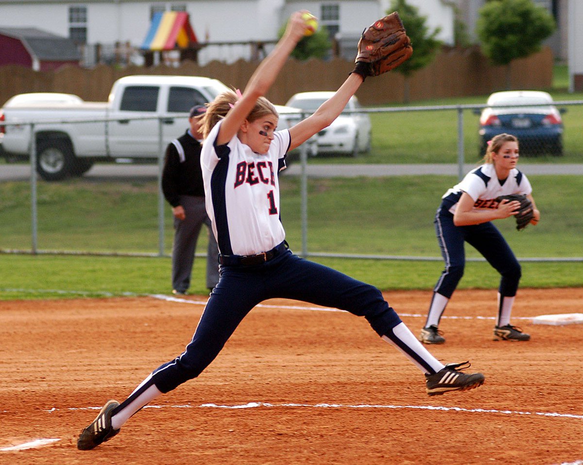 ⁦<a href="/stein1012/">Coach Stein</a>⁩  I love this one!  Kat Banks pitching while her sister Alex is ready at 1st base. This is from the 2009 Region 5AAA Championship game. I’m on a bucket in the dugout calling pitches 😁