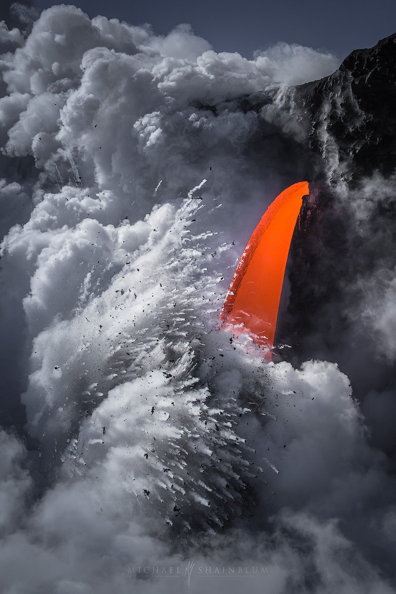 Behance's tweet photo. Powerful images by @shainblum documenting cascades of lava on Hawaii's Big Island 🌋— more photographs from the series > https://t.co/P2SUX0u6IM https://t.co/Yy30mT6CfH
