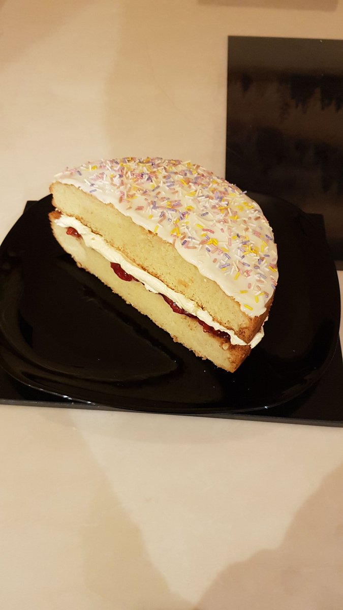 Ozmodion's tweet photo. Saving ingredients by making the bottom half of a cake, cutting it in half and placing it on top. #stoppanicbuying. https://t.co/q8Ren7znka