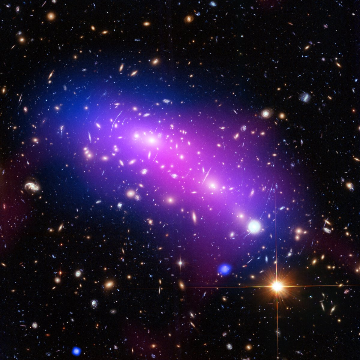 The object MACS J0416.1-2403 is an in-progress collision between two galaxy clusters. Unlike the Bullet Cluster, the collision is just beginning –– the hot gas and dark matter still mostly overlap.Image: NASA, ESA, CXC, NRAO/AUI/NSF, STScI, and G. Ogrean (Stanford University)