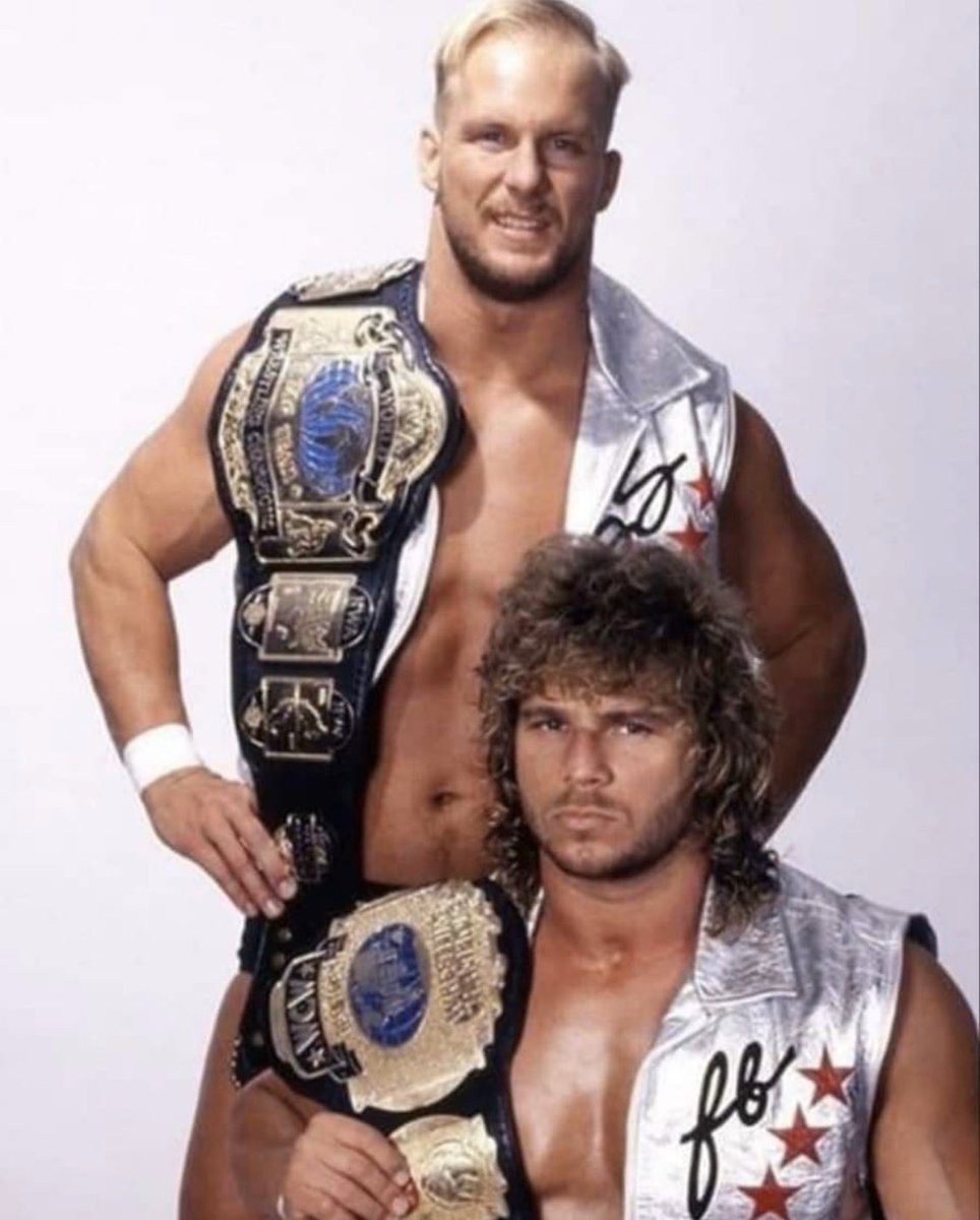 Found this picture of The #HollywoodBlondes today. @steveaustinBSR is holding an #NWA tag belt and #BrianPillman has a #WCW tag belt. Anyone know the reason behind this? @HeyHeyItsConrad @EBischoff @tonyschiavone24... Just curious 🤷🏼‍♂️