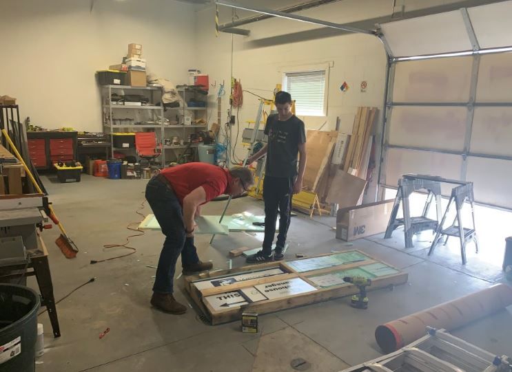 Signarama_NDen's tweet photo. During these difficult times it warms my heart to see our family come together to help our business support other businesses. Even our dog Piper was in on the action. 
#signarama #signage #familybusiness #growyourbusiness #shoplocal #business #smallbusiness #community #signshop https://t.co/L22agGoATT