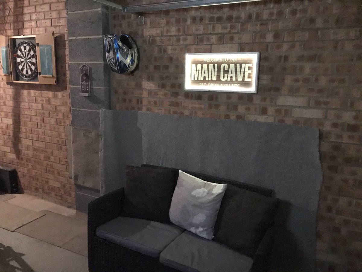 PartyParton's tweet photo. Day 5 &amp; Day 6 isolation. Garage has been converted to a bar, I’ve robbed number plates off car and found some disco lights  #isolationbar https://t.co/tzvlLCo3MD