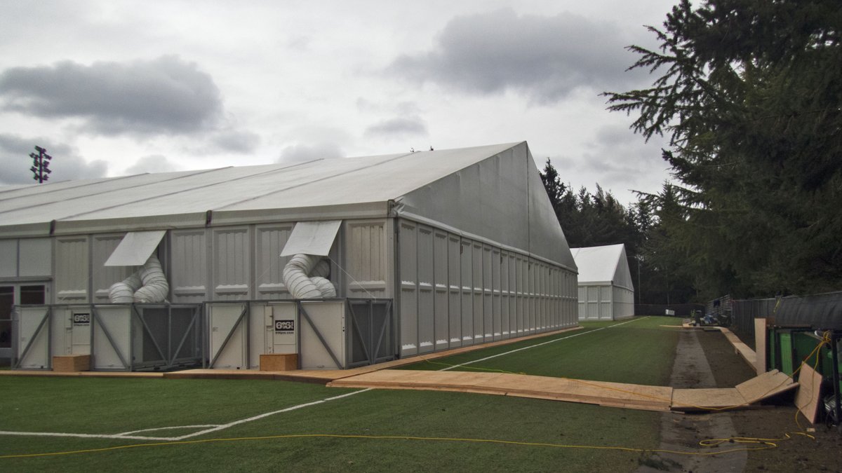 FeyalaCat's tweet photo. Looks like the field hospital they've built in the soccer field nearby added a second building https://t.co/UQzN72AbDV