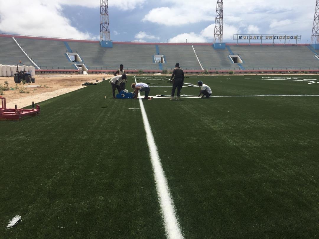 gabowduale's tweet photo. The spreading of siltic sand and rubber to increase comfort and grip marks the final stage of the football pitch of Mogadishu Stadium. The @EU_in_Somalia and @NorwayInSomalia partnered with the Somali people to wake this icon back to life. https://t.co/bgBkCVCyOU