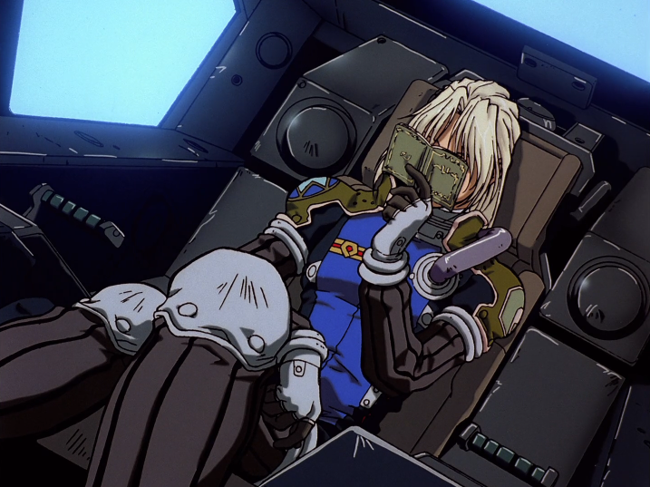Zechs is just chilling in space, reading a very tiny book.