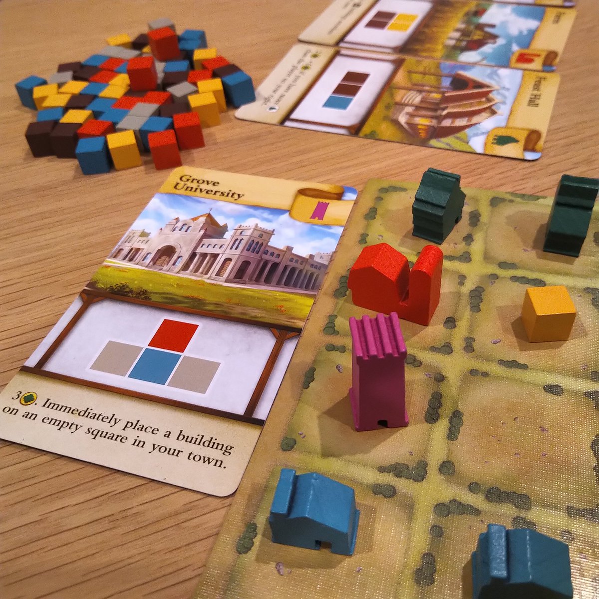 I3Rpg's tweet photo. Bringing someone from "Board Games aren't really my thing" to "Keen for a 4th round?" is a terrific feeling ☺️ 🎲 #boardgames #tinytowns #tabletop https://t.co/klI4L12dAe