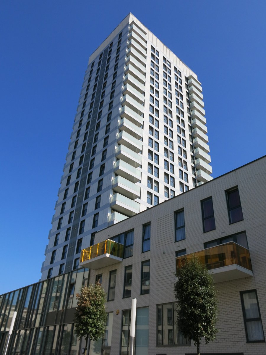 15/ Denning Point, Commercial Street - now a mix of affordable-rent and private leasehold flats; designed by Elie Mayorcas for the Greater London Council in 1968. Dubbed 'Heroin High-Rise' by the media before redevelopment after years of neglect. Shown here in 2019 and 1988.