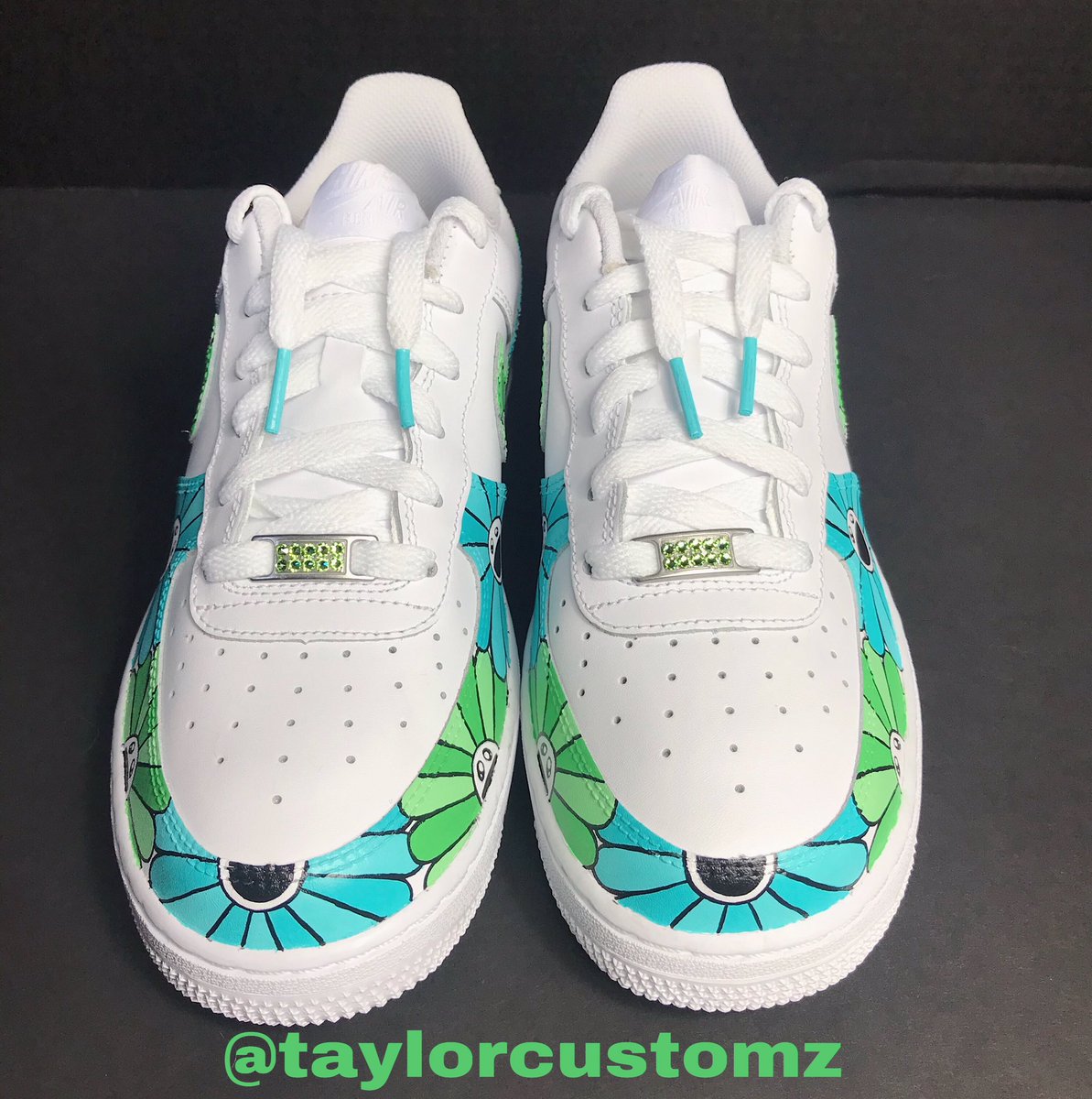taylorcustomz's tweet photo. Teal and Green Murakami Flower Custom Air Force 1’s. Comes is all colors. #murakami #customshoes #af1custom #murakamitakashi https://t.co/QBSsI2tId6