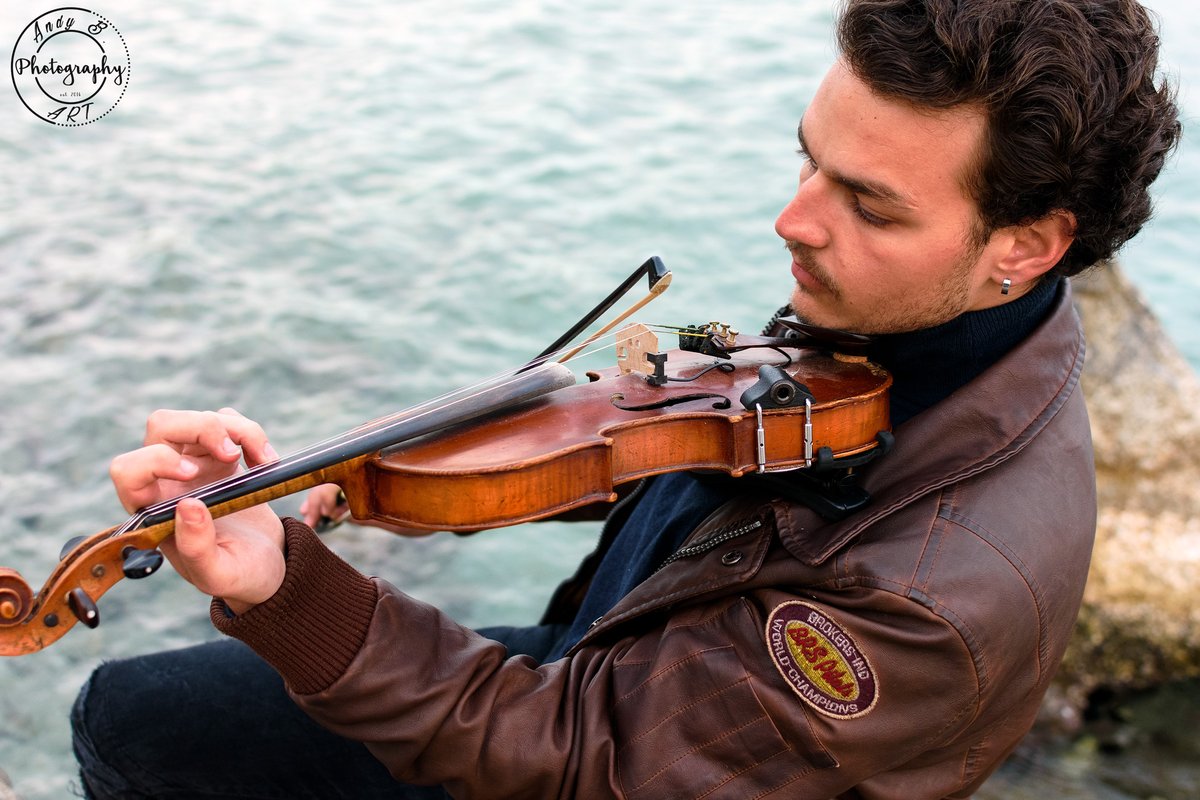 The Violist On The Sea . . . . . . #sea #violin #musician #seaside