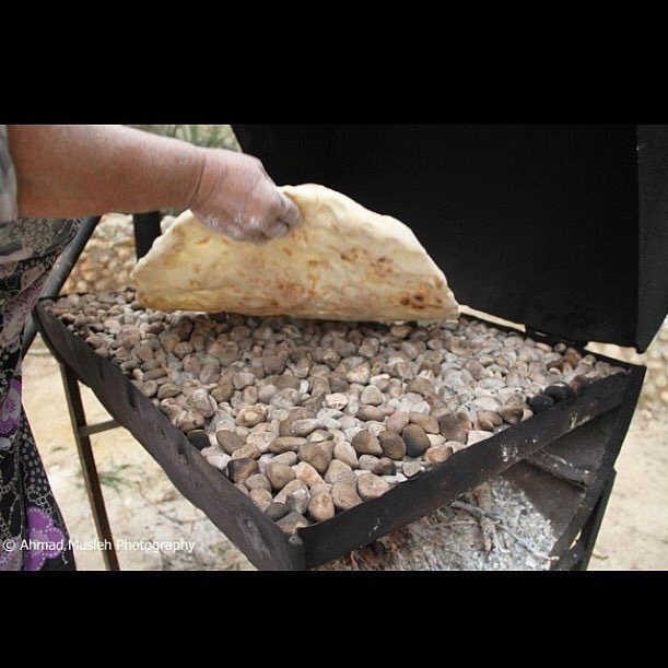 Taboun bread or khubz el taboun is the traditional Palestinian bread baked in a special oven called taboon or on hot rocks.