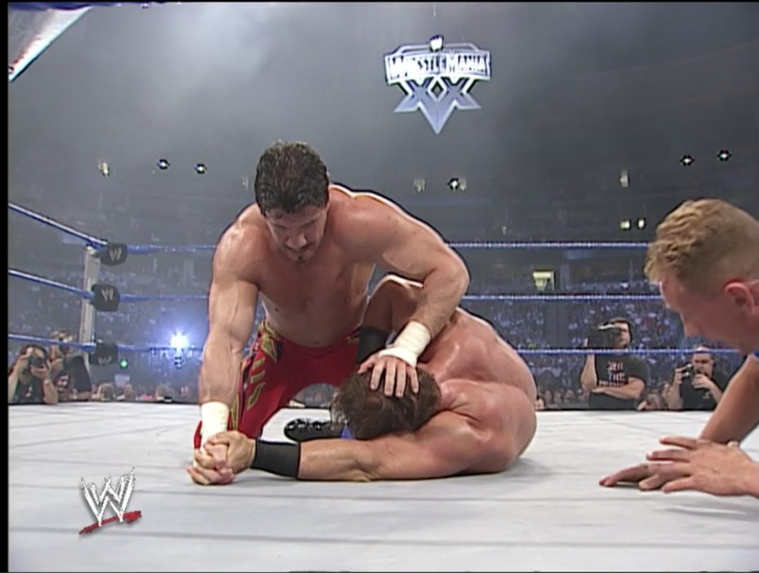 TheWrestlingCov's tweet photo. Benoit v Guerrero #Vengeance2003. (US Title)

Just watched this and another AWESOME match. I love the shot with the #WM20 logo in the background.

These two were the faces of that Mania so it was a cool foreshadow. https://t.co/fzOSXpQda0