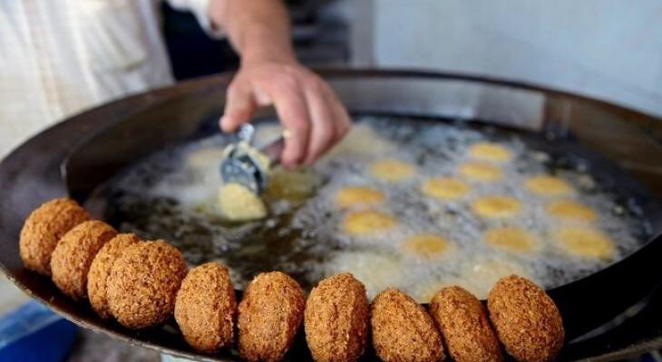 Falafel is most probably coptic/Egyptian but also one of the main street food and breakfast dishes in Palestine.