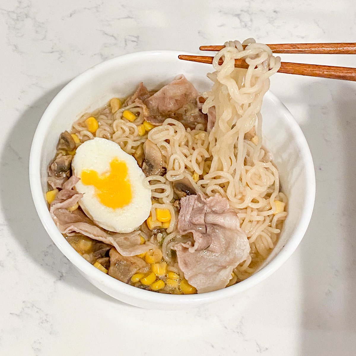 Last night’s DQFF is the best yet! The follow up to this tweet is a tutorial on how to make the egg Tonkotsu ramen with pork shabu, corn, mushrooms, and Mickey Mouse egg 