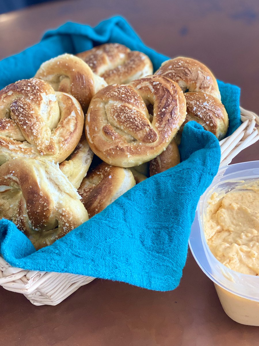 crlyoung's tweet photo. Self-isolating Sunday projects: clean and organize all the gift wrap/boxes/ribbons and experiment with soft pretzels and beer cheese!  @ashevillebrewingco  it’s the 828 Pale Ale!! https://t.co/b20SGr9bwt