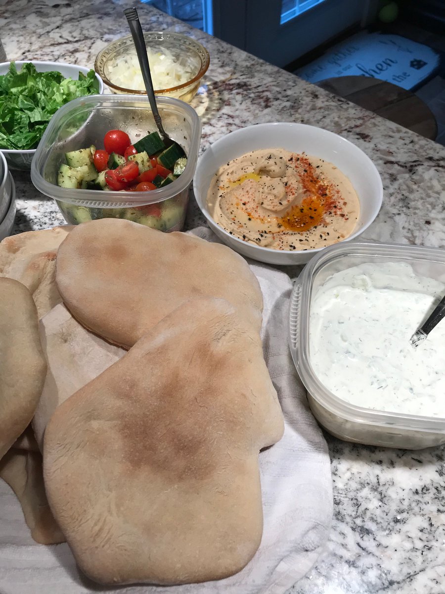 All homemade:PitaTzatzikiRoasted garlic hummus Lil greek salad(Not featured: falafel)