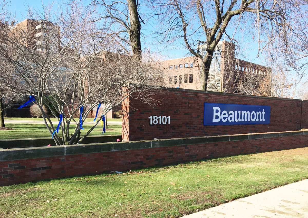 BeaumontHealth's tweet photo. Blue ribbons hung throughout our campuses to show support for front-line staff working to treat, screen and prevent the spread of COVID-19. https://t.co/5DDpMDIAPn