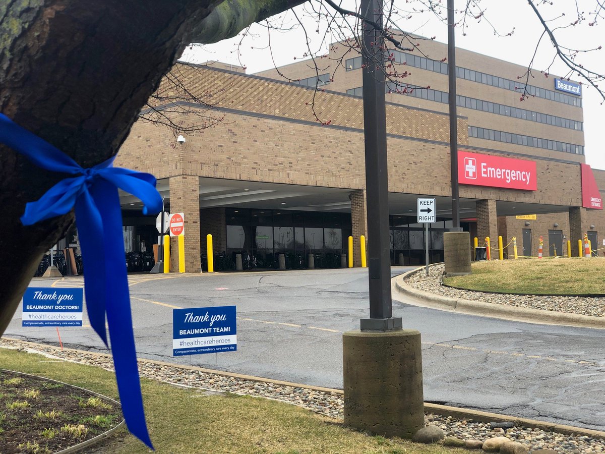BeaumontHealth's tweet photo. Blue ribbons hung throughout our campuses to show support for front-line staff working to treat, screen and prevent the spread of COVID-19. https://t.co/5DDpMDIAPn