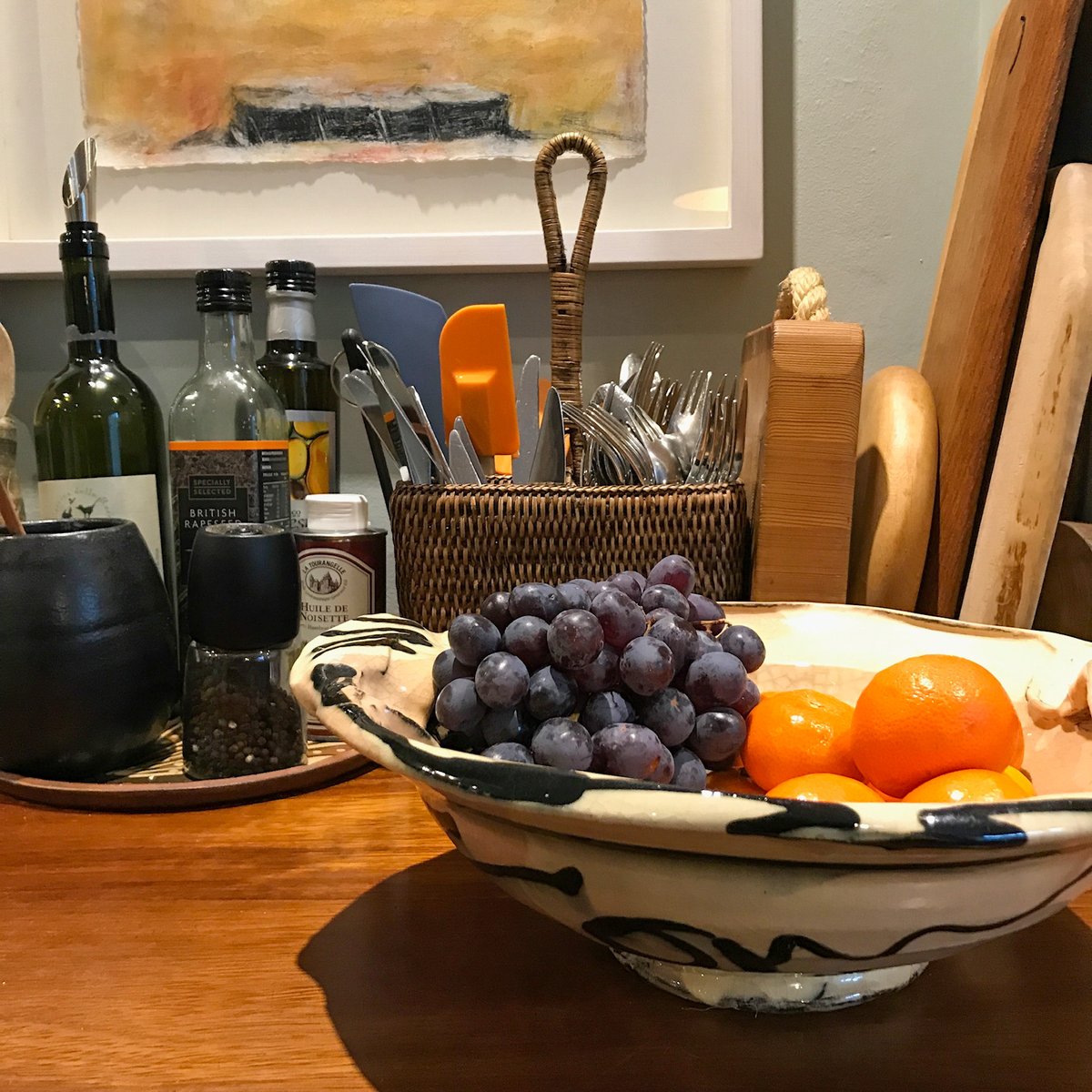 readinteriors's tweet photo. To this level have I sunk: arranging my plastic spatulas so that they complement the fruit basket [I hid the green ones] https://t.co/IIhtQrYeJp