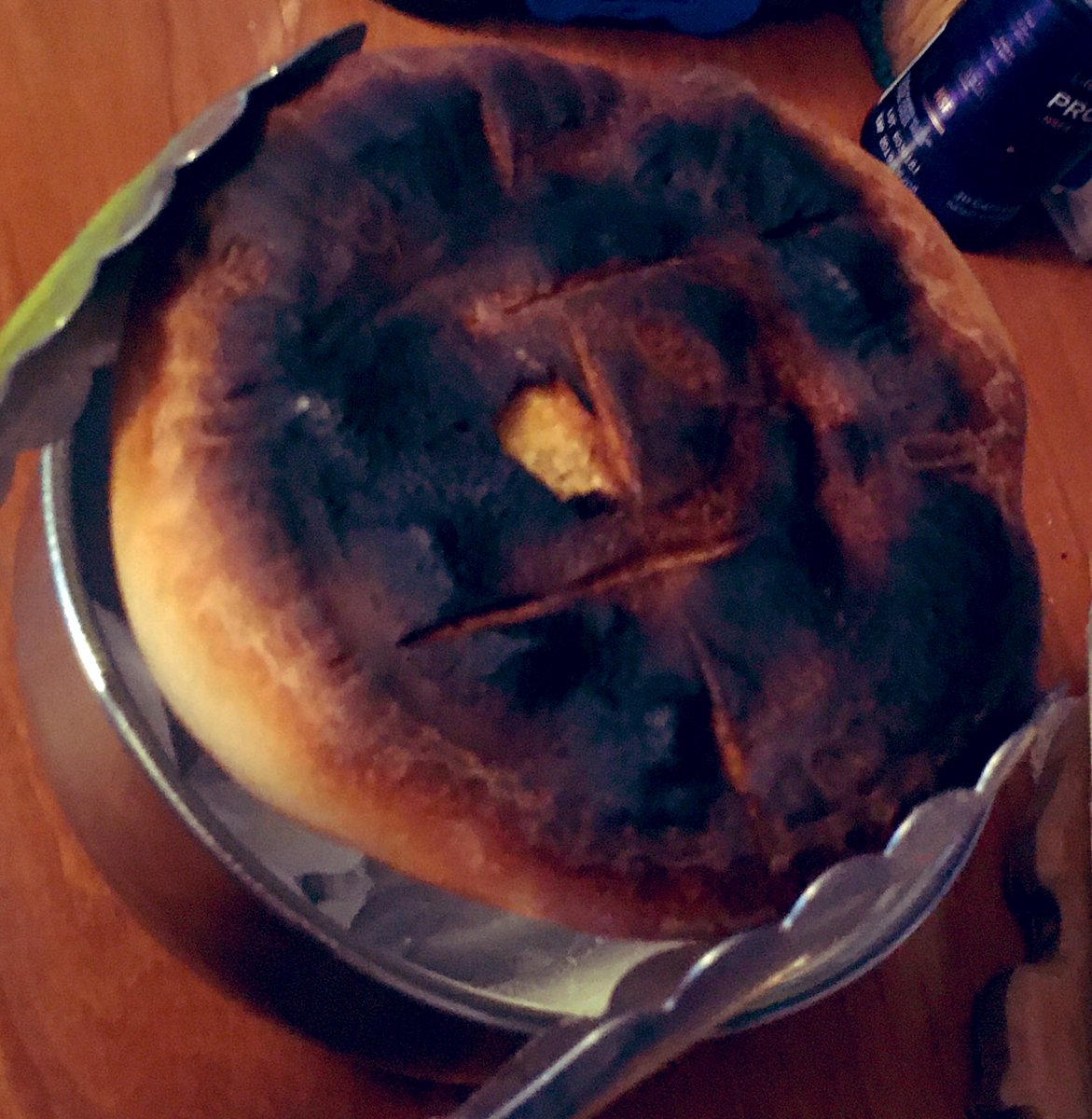 CrankyOtter's tweet photo. @SeamusBlackley Hereโs my first quarantine sourdough loaf. I forgot to set a timer. Was able to whack most of the worst burn off. Still ok inside.
#YEASTLORDS #TimingFail https://t.co/qSU0RHQ1mW