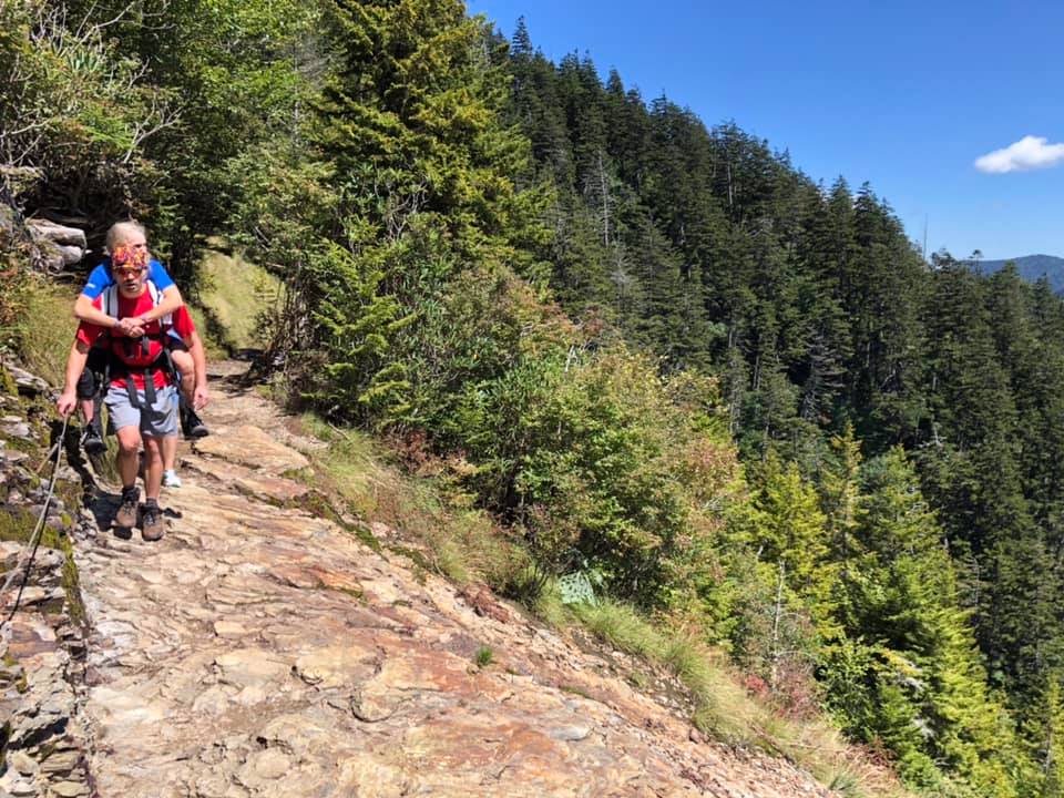JustinMartin51's tweet photo. Back in August we carried Mom up a mountain she hadn't been able to climb for the past six years due to MS. We had been going on this trip for 28 years. Leconte Lodge requires at least a steep 5 mile hike.  #SomeGoodNews https://t.co/LaEeNW3uVo