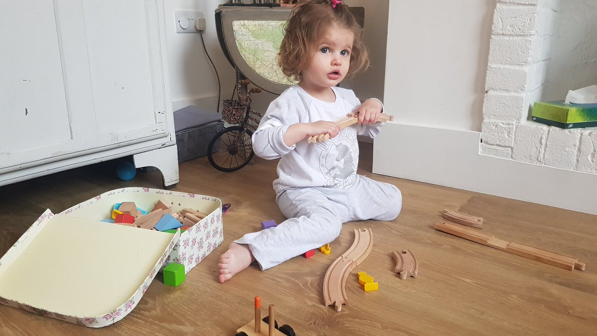 MissEmmaTurner's tweet photo. What working from home looks like! #mummyfirst #teacher #20monthsold #letsbuildatraintrack https://t.co/EpMV7yNchf
