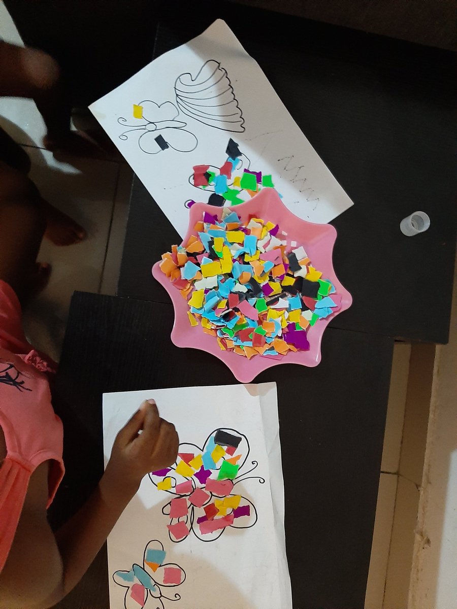 Day 11. We've kind of adapted to being indoors a lot. Thank goodness for electricity.Today we did sticky pictures! Tear up sheets of coloured paper, draw an outline with a marker and give them glue.  #lagoslockdown  #COVID19Nigeria  #MummyTwitter