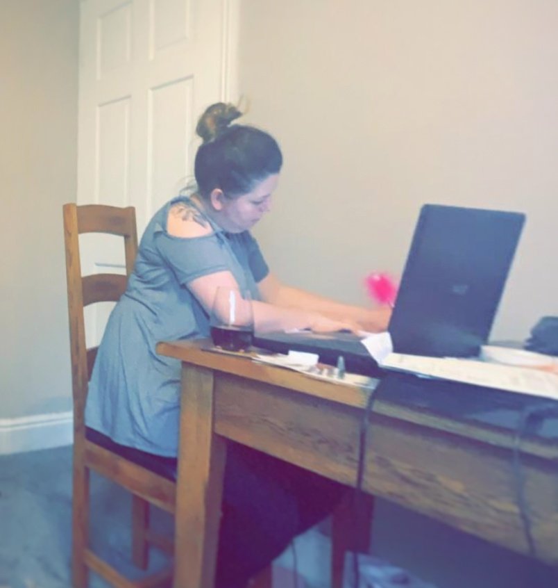 charperforms's tweet image. This was me at my new working station last night.... Red wine and fluffy unicorn pen in hand