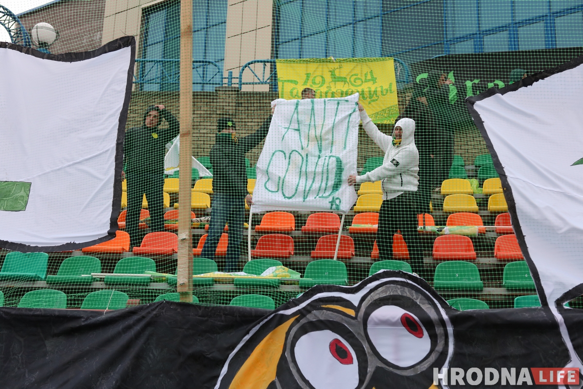 fcneman's tweet photo. "Today we're supporting for each of you!" Our great 💛💚 yellow-green #fcneman #ANTICOVID19 fans on the stands in yesterday match! Thank's for all! 
📷 https://t.co/Y5w2tDk1lc https://t.co/n7YflTh3dD