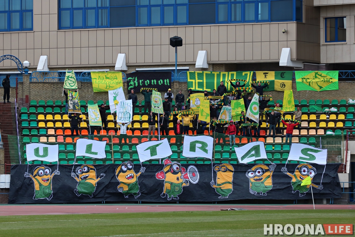 fcneman's tweet photo. "Today we're supporting for each of you!" Our great 💛💚 yellow-green #fcneman #ANTICOVID19 fans on the stands in yesterday match! Thank's for all! 
📷 https://t.co/Y5w2tDk1lc https://t.co/n7YflTh3dD
