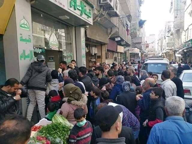 Selling subsidized bread in al-Qazzaz, Damascus today. The lines for bread are getting longer, prices , many Syrians have not been able to secure bread in days & the quality of bread + its size . The regime is unable to secure the cheapest source of calories for its people
