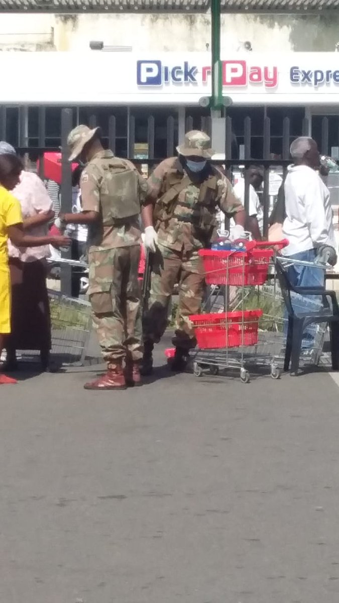 Maseniz's tweet photo. Serving water to yhe elderly while they wait in line at shoprite umlazi #SANDF #DAY4 #Whencoronaisover https://t.co/XzgEtiGN5w