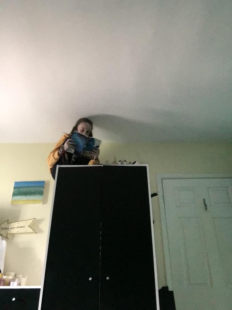 keith2013sarah's tweet photo. @Broadlands_hfds Jessica’s reading task today was find the most unusual place to read in your home. She read a chapter from 12 nights 😀😀 https://t.co/4dkIw4MeQr