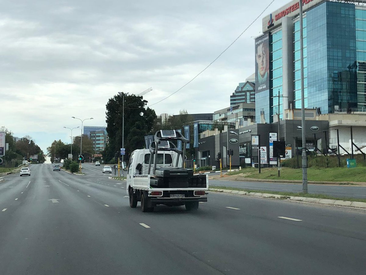 POWER987News's tweet photo. People transporting treadmills in Sandton due to the current jogging ban. Covid19SA #LockdowSA https://t.co/cxmnvXWJUd
