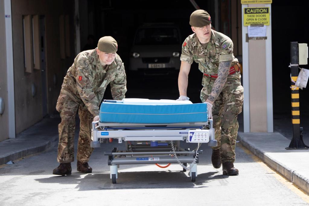 RoyalGIBRegt's tweet photo. RG troops assisting the local population, moving medical supplies at St Bernhard's Hospital and the medical facility at Europa Point as part of British Forces Gibraltar's 🇬🇮 response to #Covid_19. Great work all. NEH. @QueensDivision @BritishArmy @RMASandhurst @ForcesNews https://t.co/znK5fNbi0G