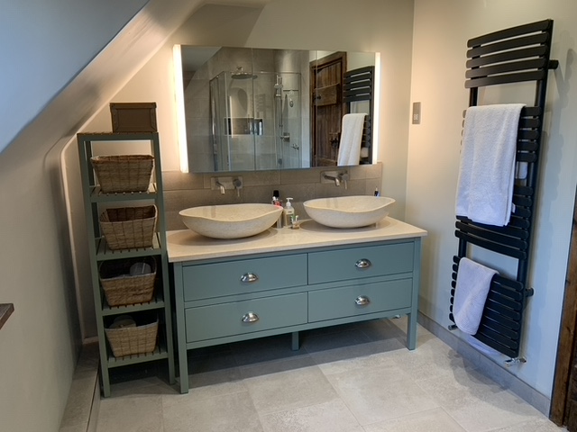 Another satisfied customer. Philip from Kettering has sent us these photos of his finished bathroom. Two of our galala marble Miren basins and a matching countertop work beautifully with the tiles and the coloured furniture. It's a great look...