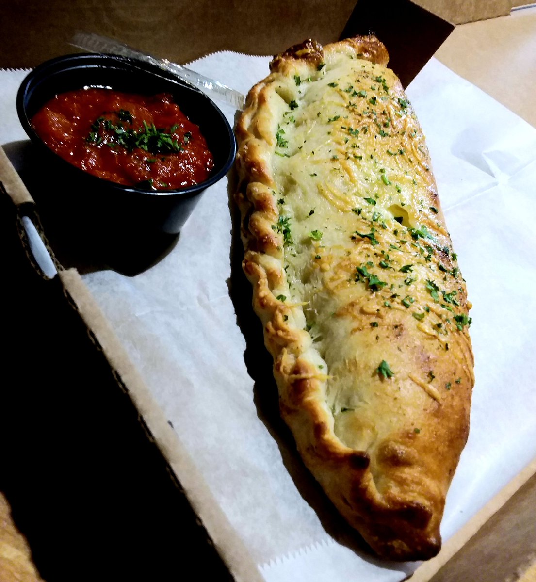 brickandfire's tweet photo. Cheese Calzones for lunch special today. Per the standard Lunch Menu at Brick &amp; Fire, a beverage is included with the Calzone. 

Food pics these days are taken in to go containers and pizza boxes...

Be safe, be well, be apart but together, 
Chef Mark Dollard https://t.co/ZHOpOyaGrH