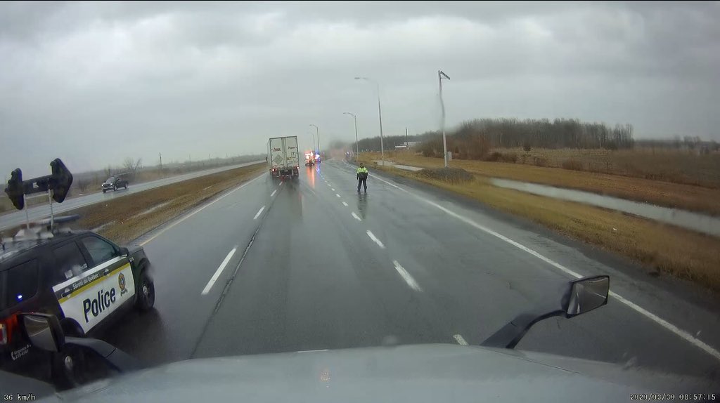 TdotTrucker's tweet photo. Roads are wet, provincial checkpoints setup, family at home is concerned for my safety but we have to persevere to keep goods moving. Everyone is counting on us #Truckers #Trucking #driversperspective #Covid_19 #coronavirus *pictures come from mounted dash camera #StayHomeCanada https://t.co/tRyL5hessz