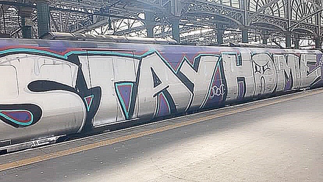 A train which was parked overnight at Wemyss Bay station has been graffitied with a message for travellers to stay at home.

The graffitied ScotRail 385 was spotted at Glasgow Central station.