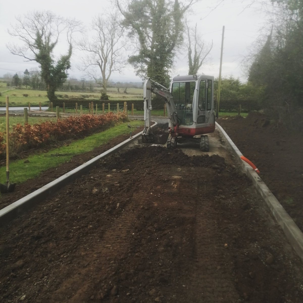 StevenMcneilly's tweet photo. A lane we completed using Tobermores 6x5 kerbs 

#tobermore #takeuchi #KERBING #digging #groundwork https://t.co/jlJT069dE6
