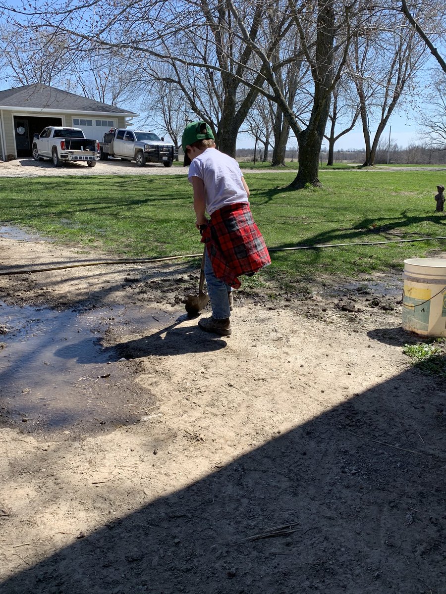 CaraMcClellan's tweet photo. Draining a water hole for his PE activity today. That’s what happens when you have a farmer for a dad and no school due to being quarantined #farmhand #farmraised https://t.co/F6O9rmwTsH
