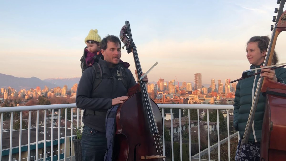 VSOrchestra's tweet photo. VSO Assistant Principal Bass, Noah Reitman shows us how he and wife Maggie practice their scales while practicing social distancing as a family. Baby Madeline supervises the session! https://t.co/6F3WxUVJLq #MyVSO #MusicMonday #Vancouver https://t.co/oUsl6N0kEx