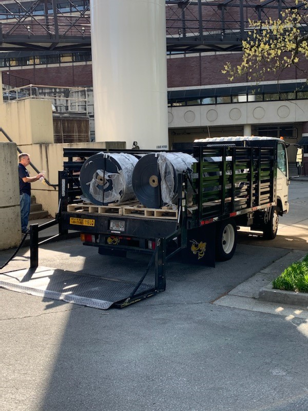 GeorgiaTech's tweet photo. Our neighbors at @CocaColaCo here in Atlanta brought 6,000 pounds of plastic sheeting to campus, where our students and faculty will use it to make more than 50,000 plastic surgical shields to be donated to hospitals across our area as we battle COVID-19. #SwarmStrenGTh https://t.co/CFWc2X4qr1