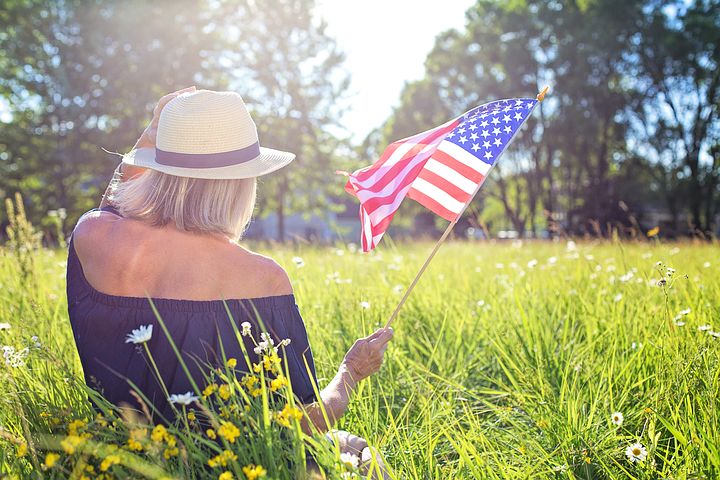 As you know, I post a photo of the American flag once a week. This week's picture shows a patriotic woman proudly waving the American flag. God Bless the USA. amazon.com/author/leegime… #America #UnitedStates #USA