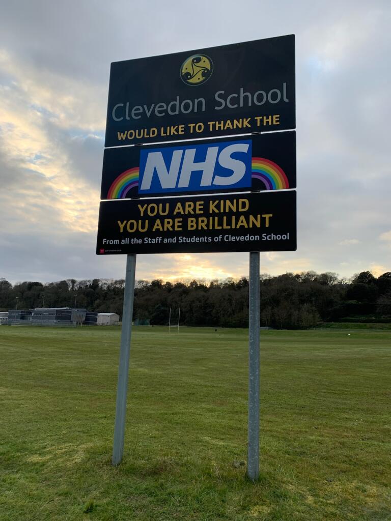 ClevedonSchool's tweet photo. Love the sky surrounding our school sign tonight #rainbowsforNHS https://t.co/nB9n2XwCBZ