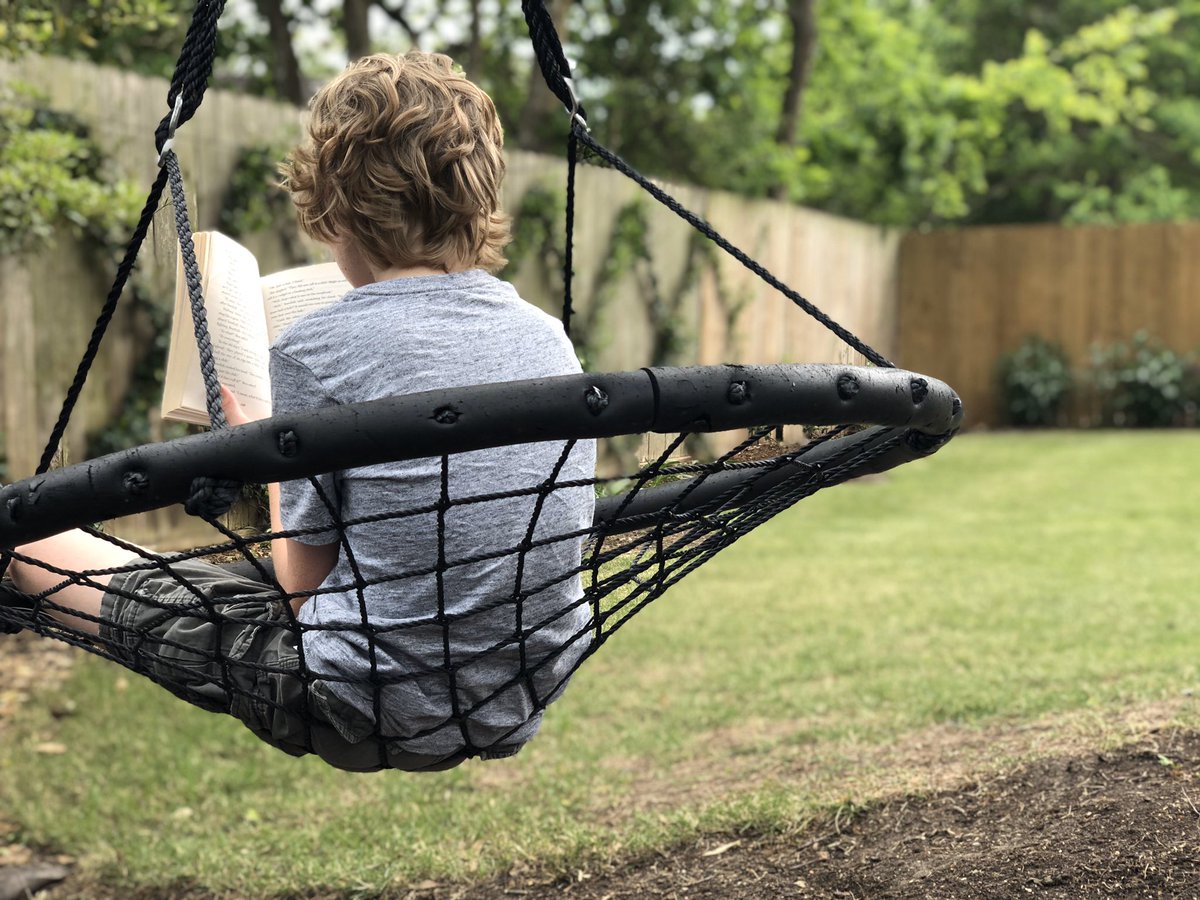 Elijah doing his reading for English at a not-so-traditional desk. <a href="/mscblackwhite/">C.Black</a> #KinkaidAtHome #kinkaidms <a href="/KinkaidSchool/">The Kinkaid School</a>