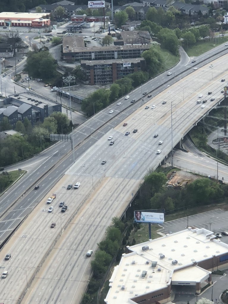 DougTurnbull's tweet photo. Three years ago today the #I85bridgecollapse went down in infamy. We flew over the scene soon after it began. And we fly over it today in strange, empty times at 5:10p on a Monday. #ATLtraffic https://t.co/vnHk4Z8AXT