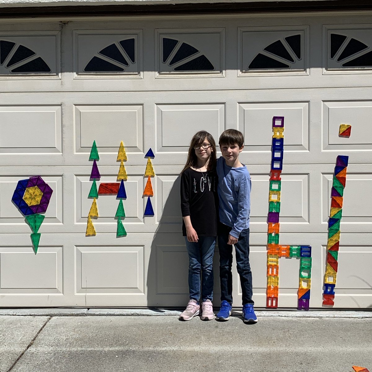 dwestphal's tweet image. Magnatiles....not just for indoor use! We spent almost 1.5 hours making designs on the garage door #stuckathome #simplefun #magnets @Magnatiles