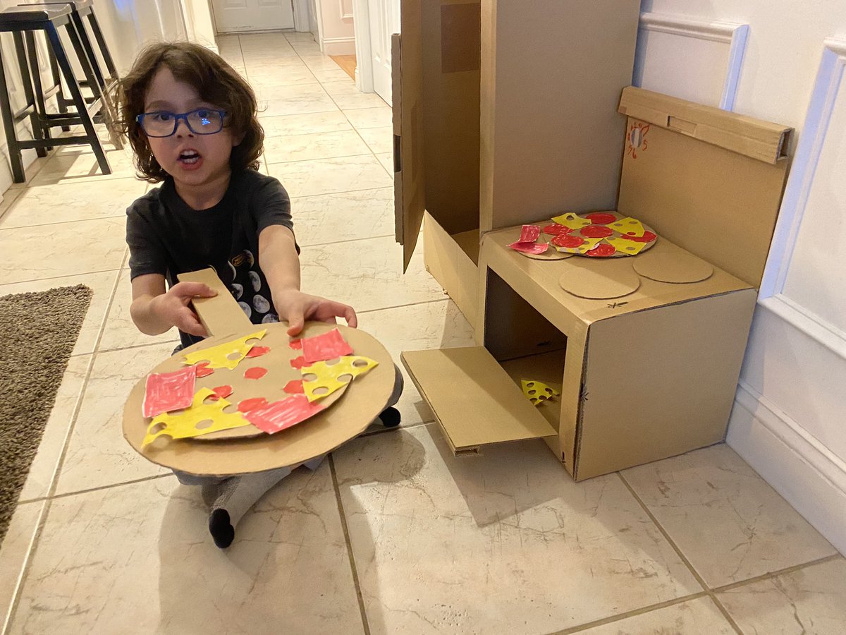 AngelaAguilar39's tweet photo. My little guy decided to make himself a pizzeria out of cardboard, with daddy’s help of course. Now we are “required” to order from Aiden’s Pizzeria daily! #MakerSpaceatHome @AEdwardsSCSD https://t.co/LalXMhiwij